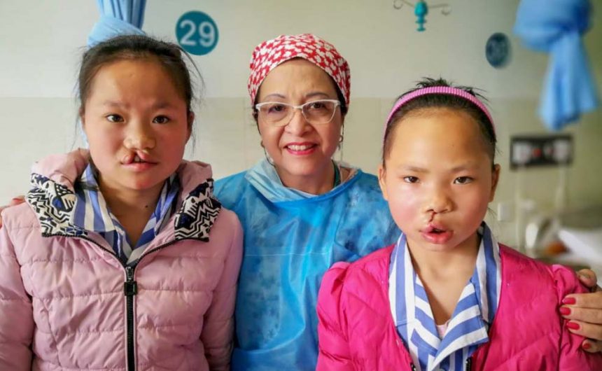 twins_with_surgeon Twins – Double Smiles, Double Happiness!