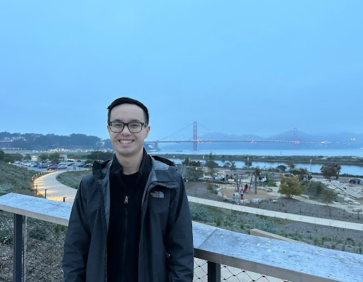 Skyler Chu posing in front of Golden Gate bridge