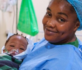 Mama with her baby post-op