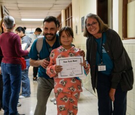AfS volunteers with patient