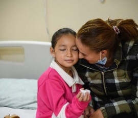 Mom and child share a tender moment