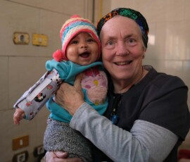 AfS volunteer with baby